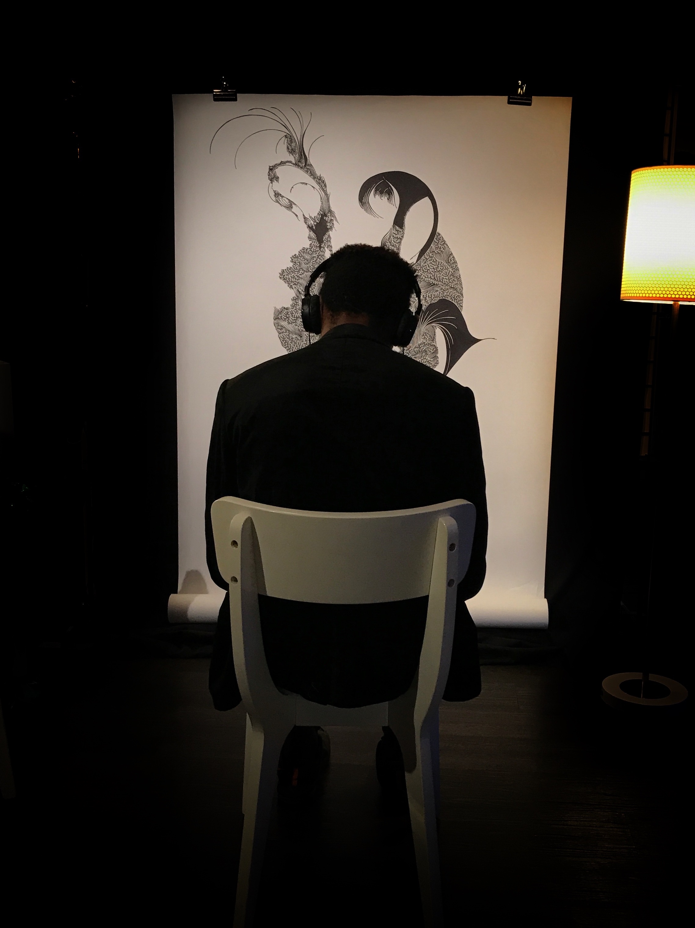 a man standing in a dark room